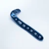 Blue-colored Anterolateral Distal Tibia Locking Plate, seen from above with a curved head of clustered holes and the letter L marked near the end of the long shaft.