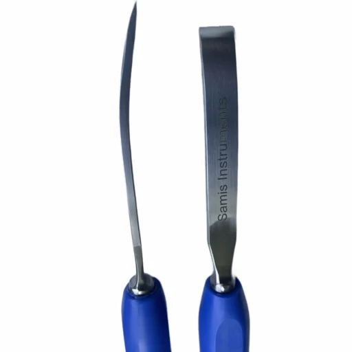 Close-up detail of CAPENER osteotome blade edge and Tufnol handle showing German stainless steel finish