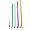 Elastic Nail products in purple, green, blue, and gold colors, standing upright with curved tips.