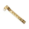L-shaped orthopedic bone plate with gold-toned finish and multiple screw holes