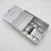 Large Fragment Instrument Set tray showing drill bits, drill guides, taps, T-handle, and screwdriver instruments arranged in a stainless steel sterilization tray