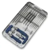 Third sterilization tray of the spinal fixation set, showing rod handling, reduction forceps, ring forceps, retractors, and a blue-handled ratchet wrench