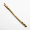 Gold-coloured Proximal Femur Long Nail with visible openings near both ends.