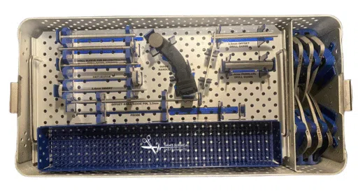 Close-up view of ACL reconstruction guides and surgical tools
