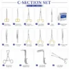 C section instrument set up with stainless steel surgical tools arranged for cesarean procedure